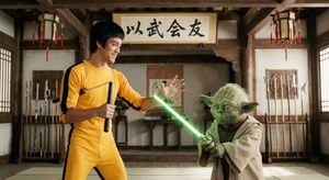 Bruce Lee, wearing a yellow jumpsuit, is having a friendly sparring match with Master Yoda. Bruce Lee holds nunchucks, and Yoda holds a s...