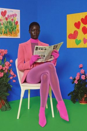 Create a 12-image Instagram feed for this character in the same aesthetic. Use pinks, blues, yellows, vivid colors. Use different locatio...
