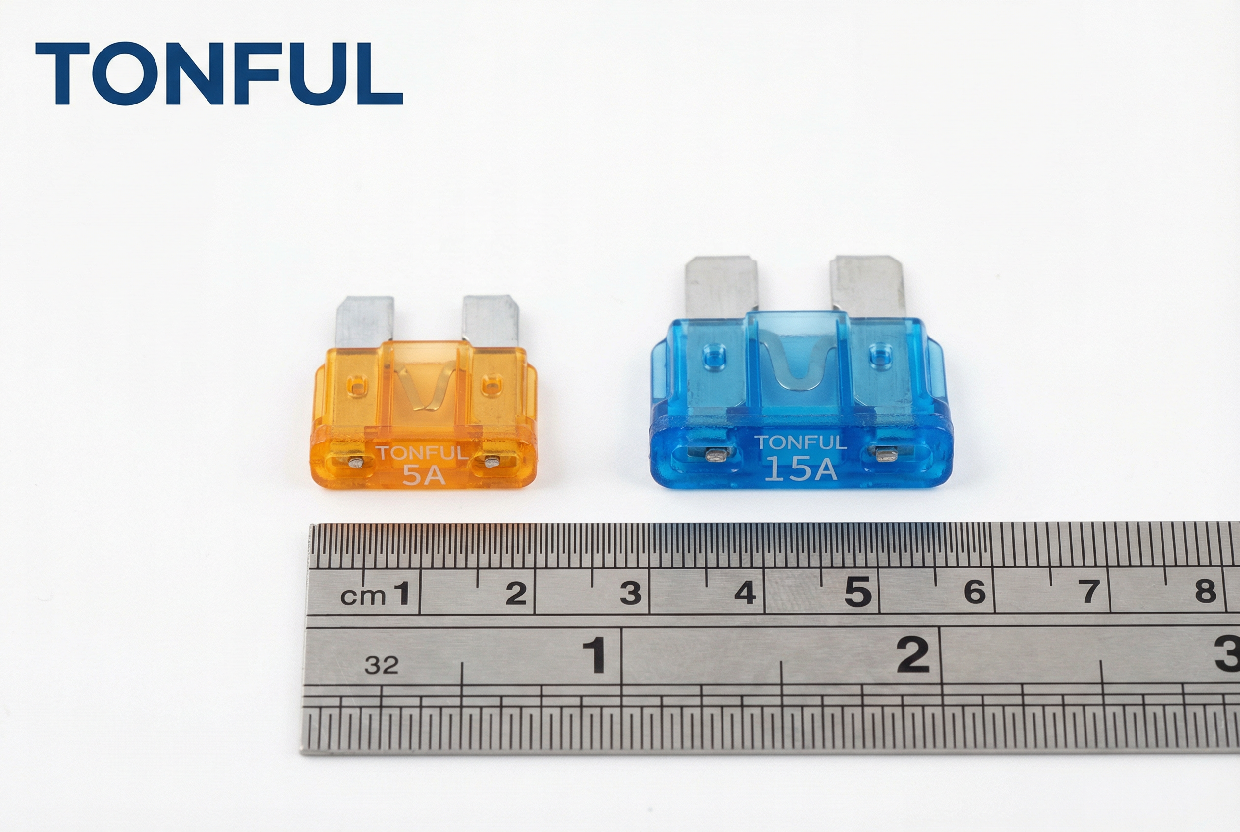 An assortment of Standard (ATO/ATC) and Mini (ATM/APM) automotive blade fuses in various colors.
