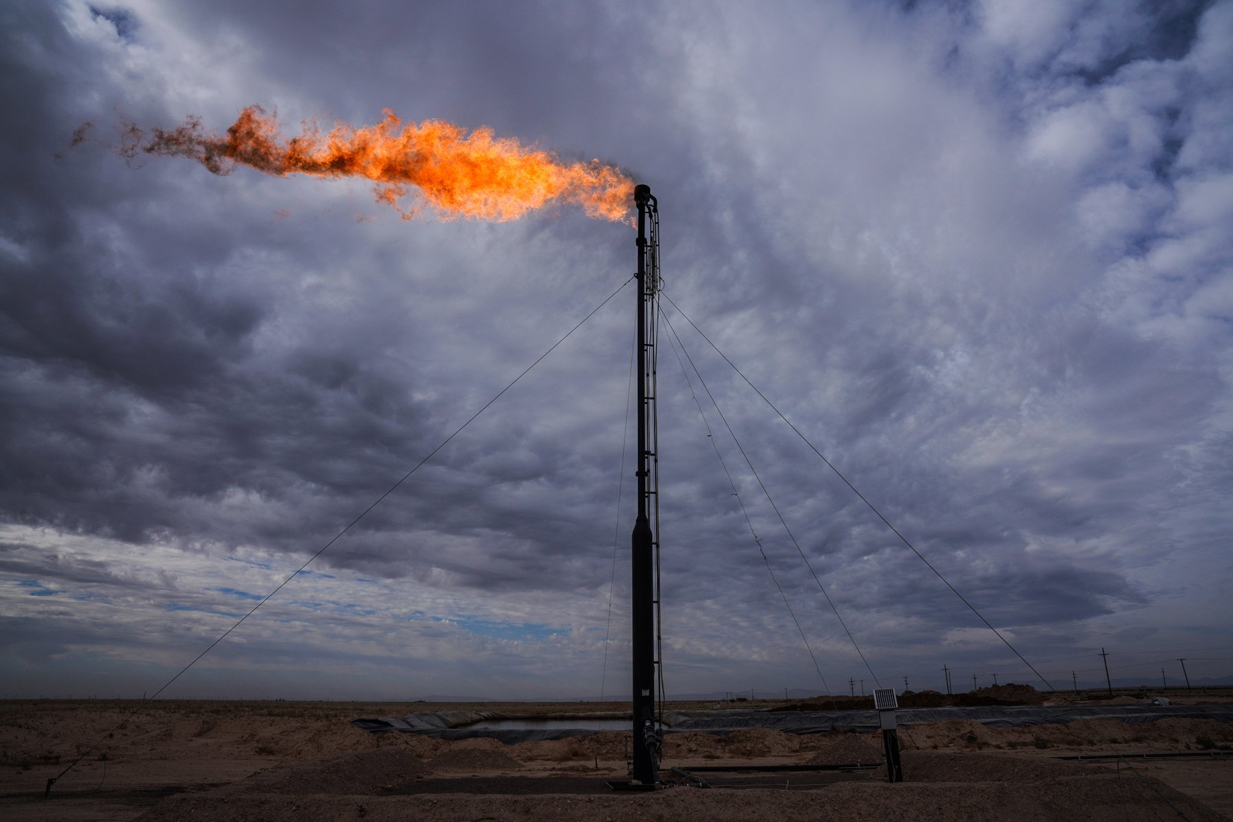 Gas flare at night in Permian Basin