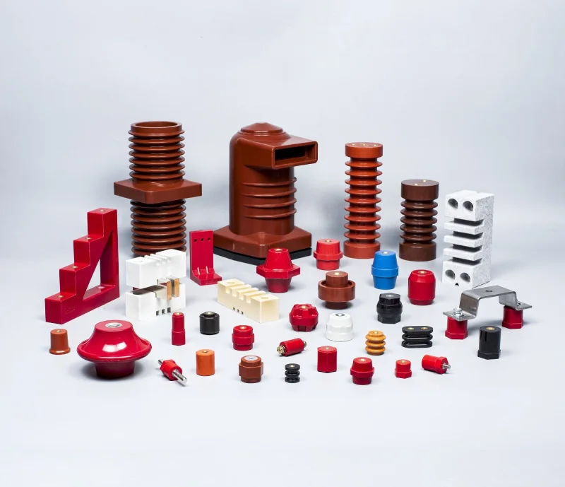An array of low voltage busbar insulators showcasing different sizes and shapes.