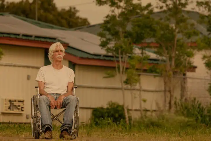 Sam Elliott in a wheelchair gazing at a West Texas sunset, *Landman* Season 2 premiere shot
